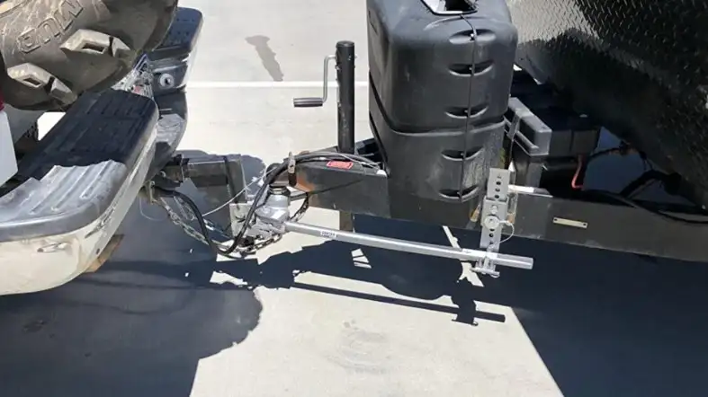 How do you adjust the weight distribution hitch