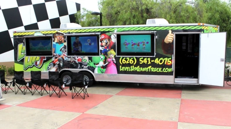 How does the cost of a video game truck rental compare to other types of entertainment options